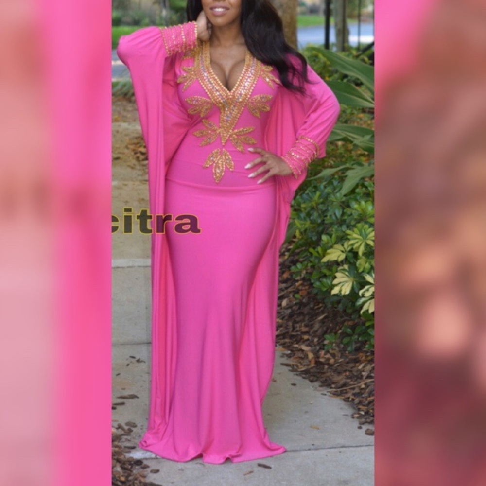 Pink stretchy kaftan. Size medium. Never worn.